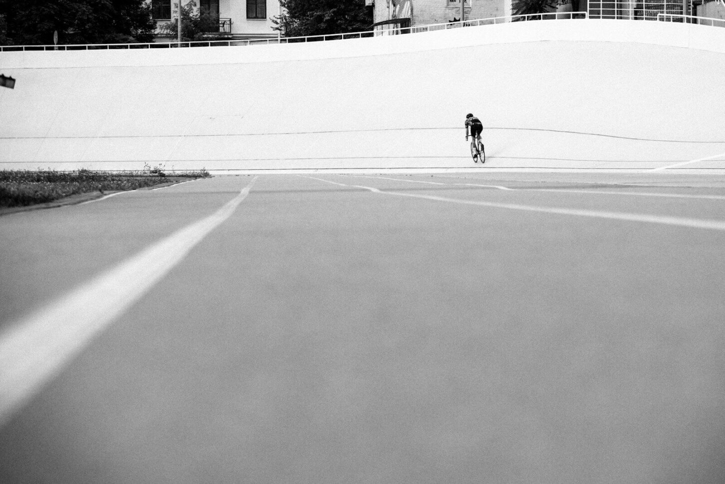 A cyclist races around the track.